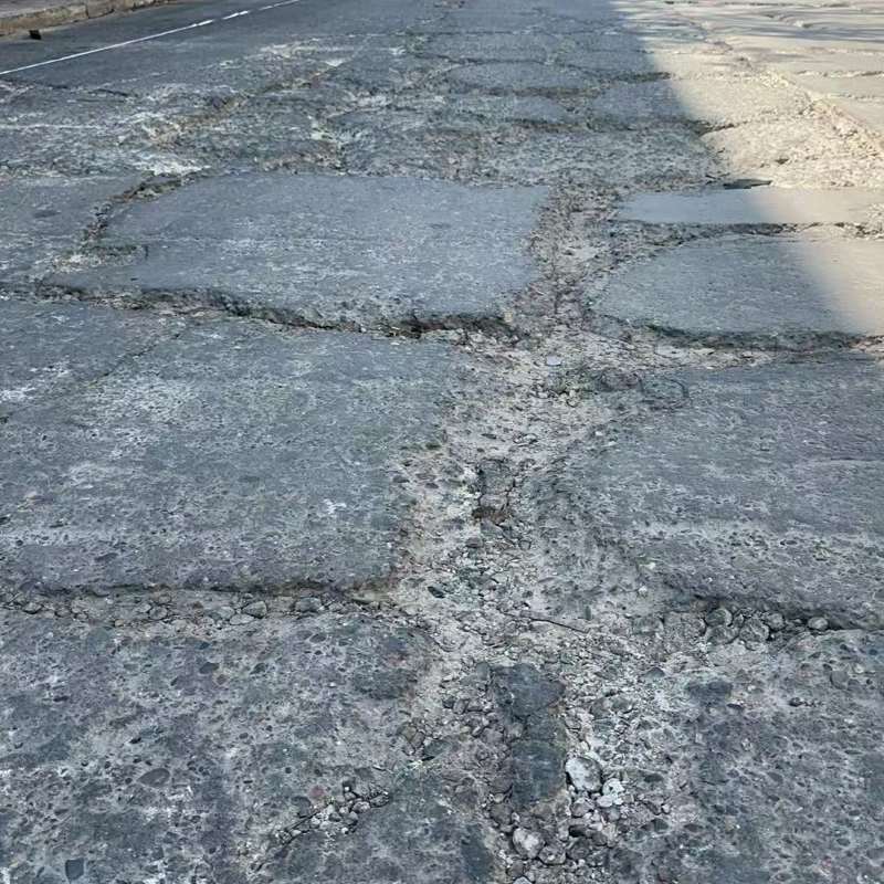 黎川路面起砂露石子修补料